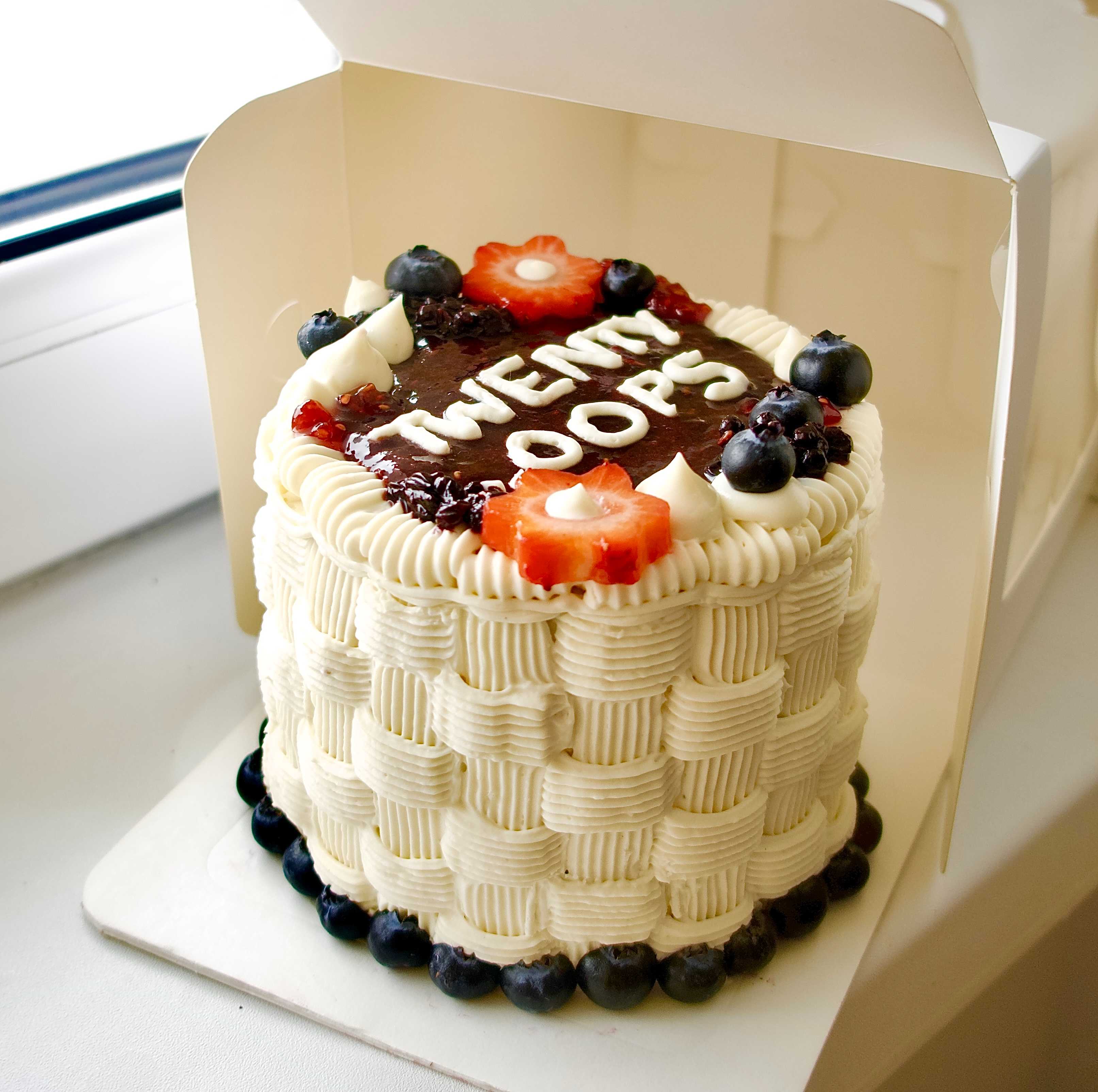 Choc Berry Birthday Cake with 'Twenty Oops' written on it